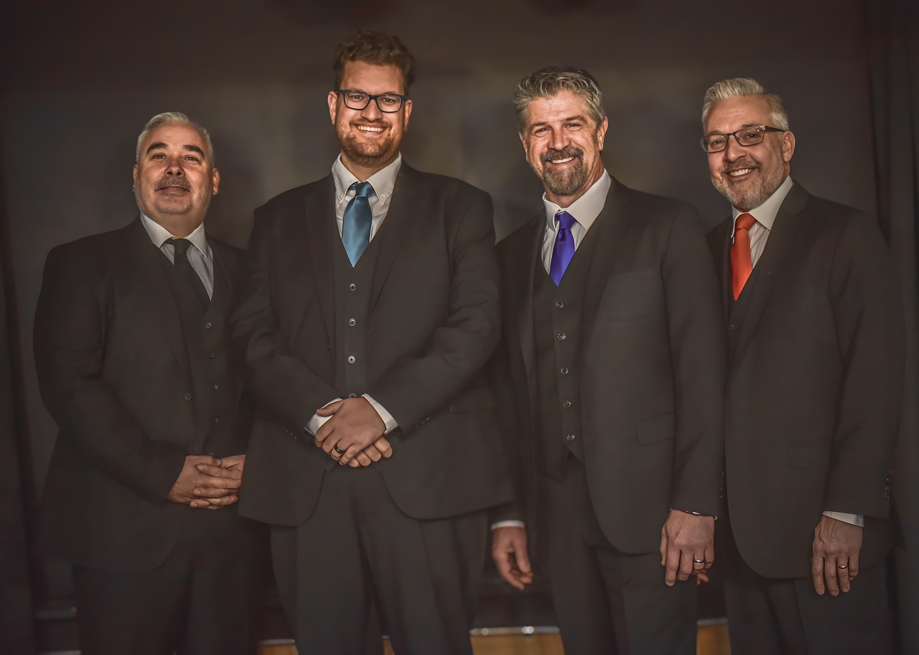 The current Chucks lineup together in suits